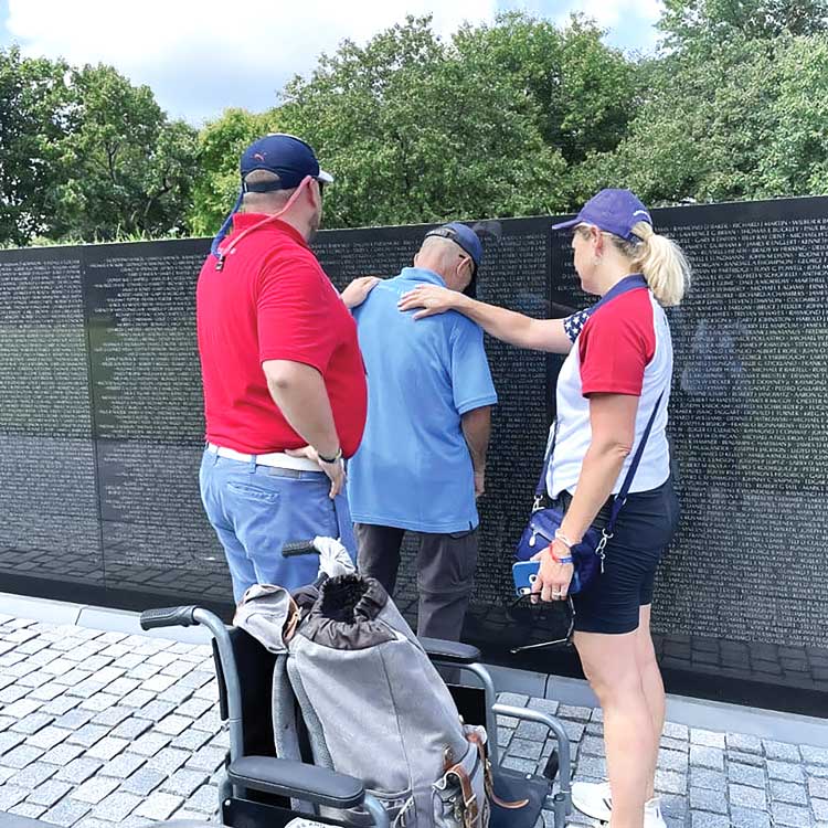 Honor Flight participant and volunteers 